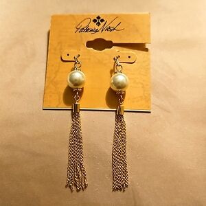 Patricia Nash long drop earrings with pearl like glass beads and gold tassels.